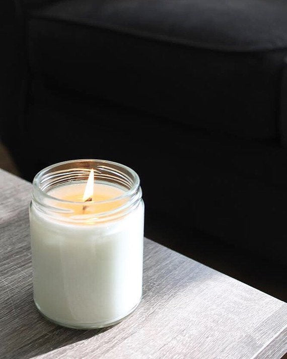 Fall scented candle chai, cinnamon, nutmeg, and clove.