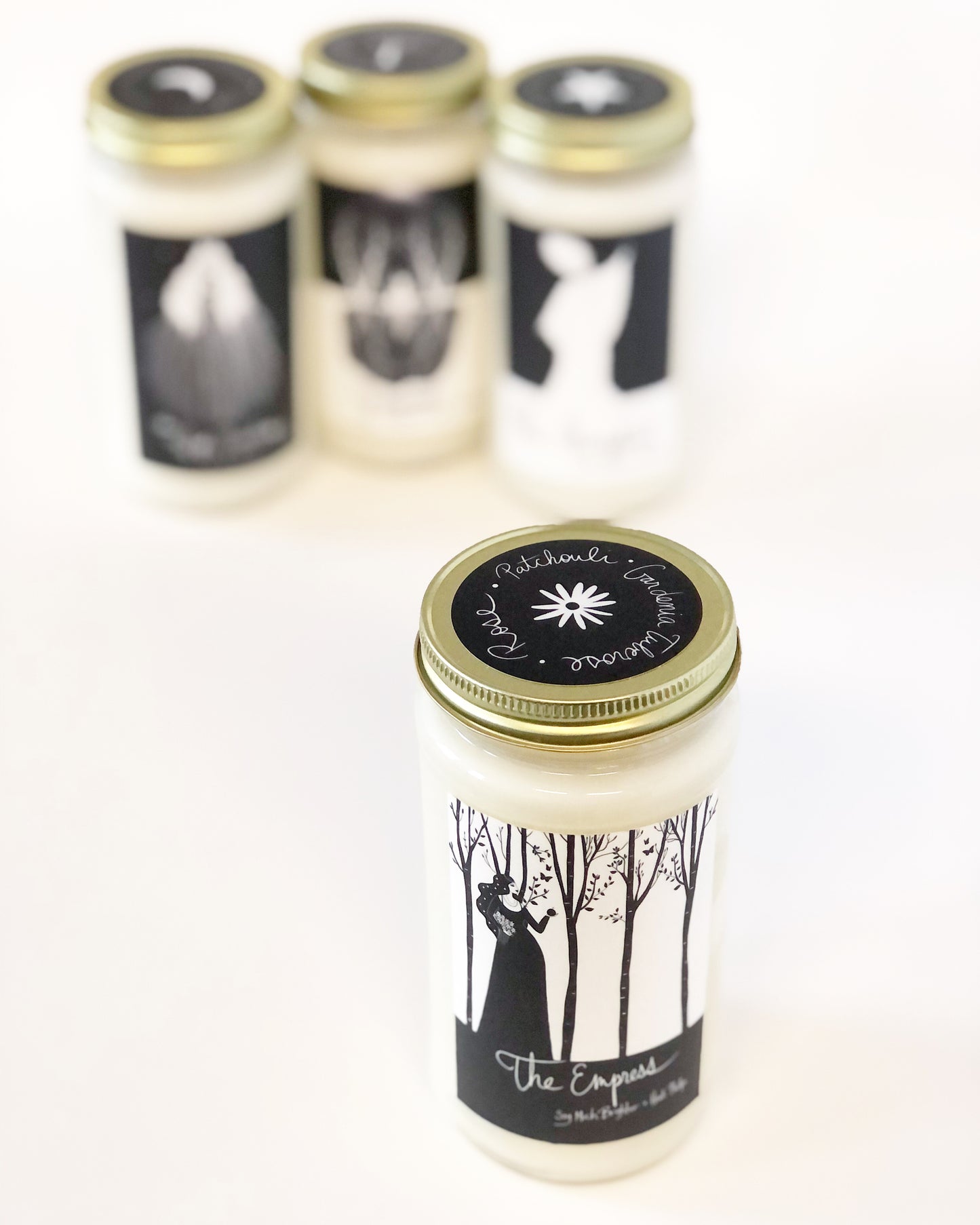  Rose scented candle with notes of patchouli & gardenia.